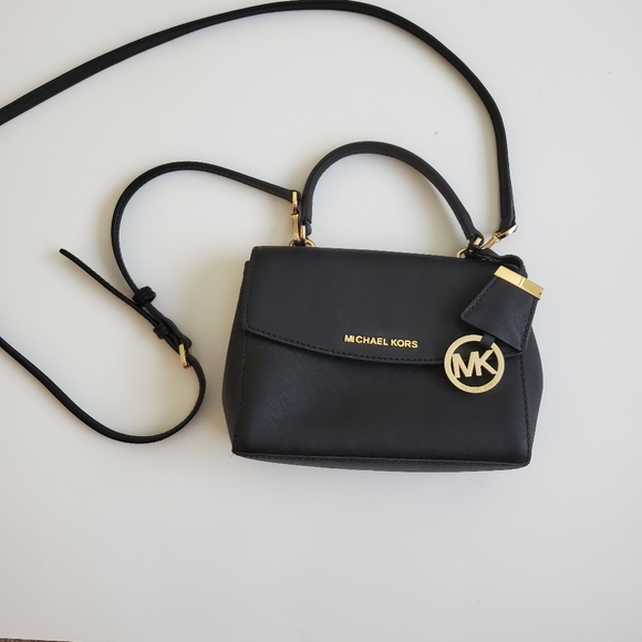 Michael Kors Ava Jewel Extra Small Crossbody in Black  Michael kors  handbags black, Michael kors handbags sale, Handbags michael kors